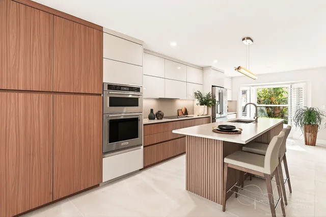 A walnut kitchen designed by Twice The Style